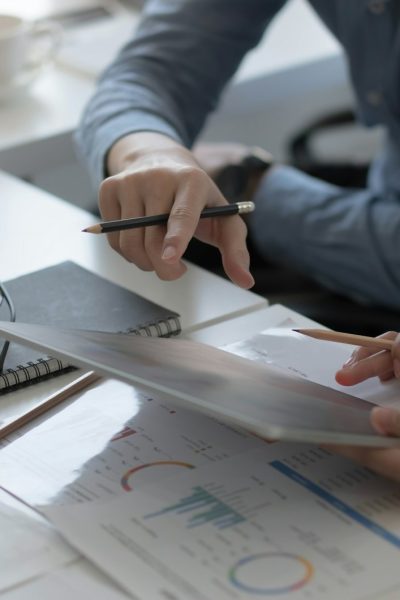 Team of business people working together in the meeting room office, teamwork background charts and